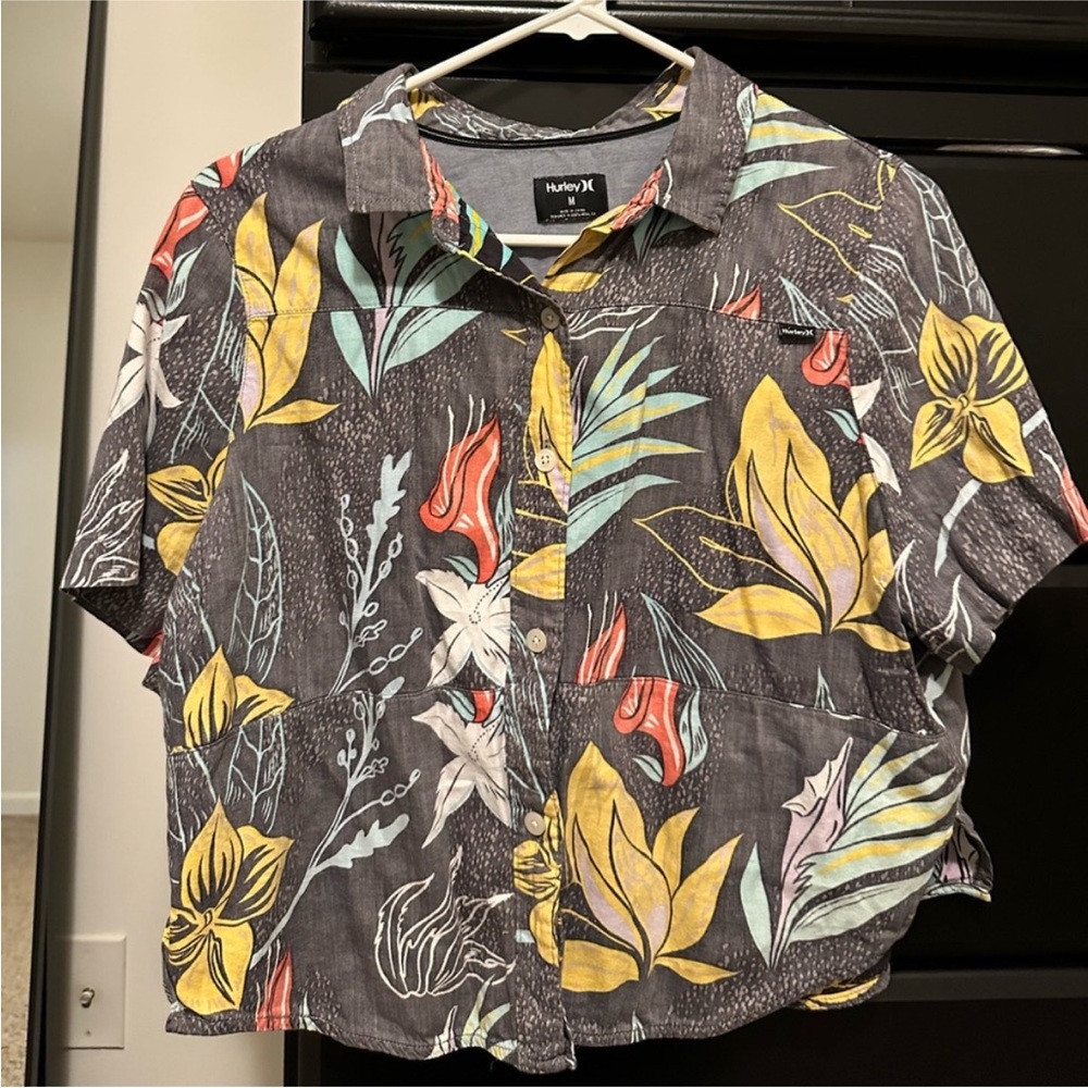 2 button down shirts , plus 1 tank top